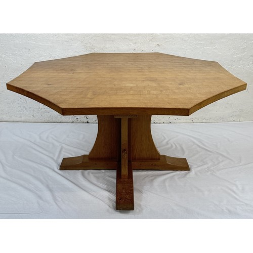 316 - A Robert 'Mouseman' Thompson adzed oak octagonal dining table - approx. 74cm high x 135cm wide x 135... 