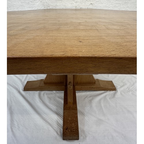 316 - A Robert 'Mouseman' Thompson adzed oak octagonal dining table - approx. 74cm high x 135cm wide x 135... 