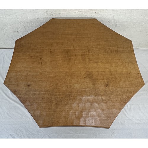 316 - A Robert 'Mouseman' Thompson adzed oak octagonal dining table - approx. 74cm high x 135cm wide x 135... 