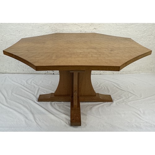 316 - A Robert 'Mouseman' Thompson adzed oak octagonal dining table - approx. 74cm high x 135cm wide x 135... 