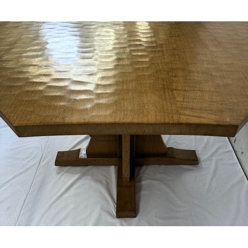 316 - A Robert 'Mouseman' Thompson adzed oak octagonal dining table - approx. 74cm high x 135cm wide x 135... 