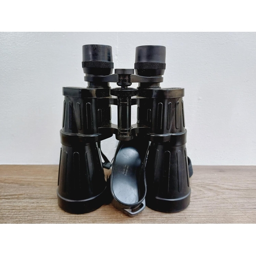 1078 - A pair of Optolyth Alpin 10x50 rubber-armoured binoculars - made in West Germany