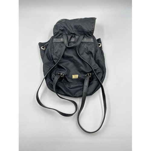 726 - A 1980s Moschino Redwall black nylon drawstring backpack - approx. 25cm high x 20cm wide