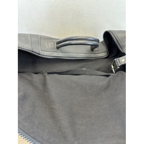 734 - A Samsonite black leather holdall