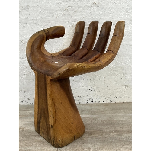 10 - A carved hardwood hand chair - approx. 67cm high x 40cm wide x 45cm deep