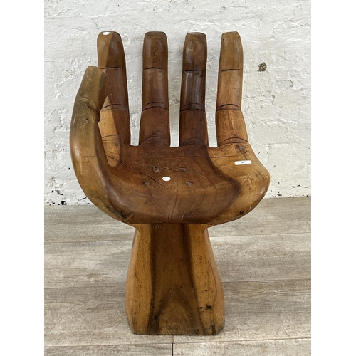 10 - A carved hardwood hand chair - approx. 67cm high x 40cm wide x 45cm deep