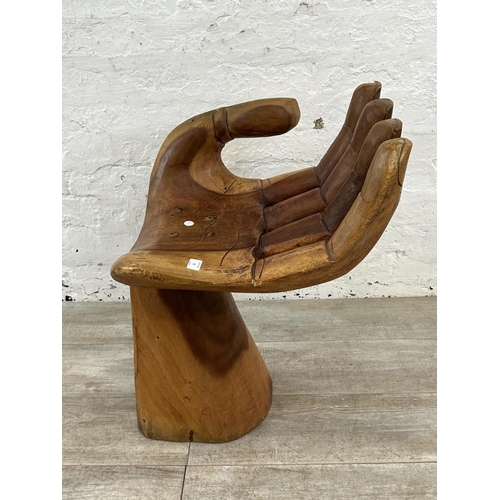 10 - A carved hardwood hand chair - approx. 67cm high x 40cm wide x 45cm deep