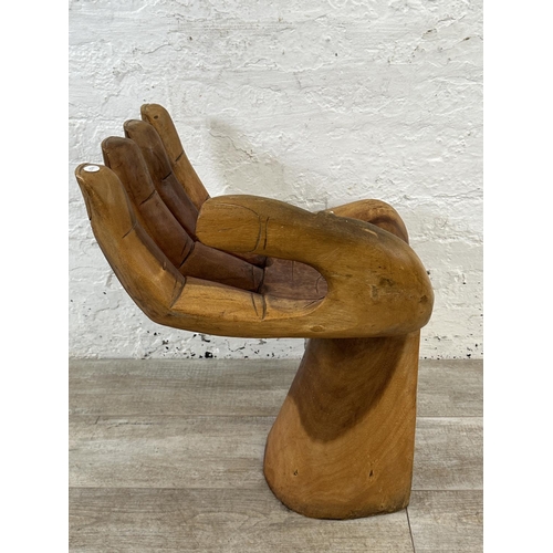 10 - A carved hardwood hand chair - approx. 67cm high x 40cm wide x 45cm deep