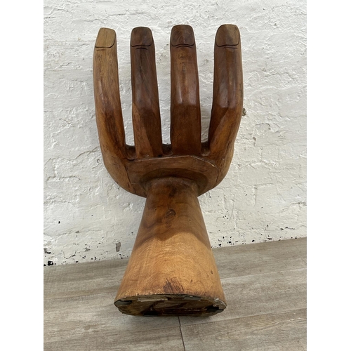 10 - A carved hardwood hand chair - approx. 67cm high x 40cm wide x 45cm deep