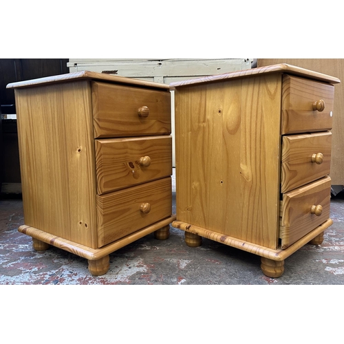 100 - A pair of pine bedside chests of drawers - approx. 62cm high x 45cm wide x 43cm deep