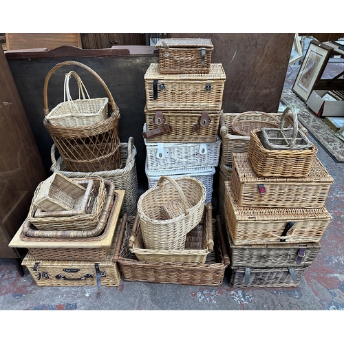 111 - Twenty four various wicker baskets