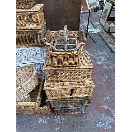 111 - Twenty four various wicker baskets