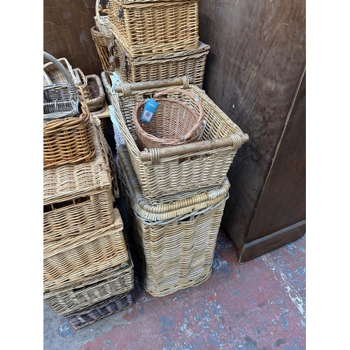 111 - Twenty four various wicker baskets