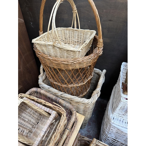 111 - Twenty four various wicker baskets