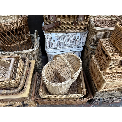 111 - Twenty four various wicker baskets