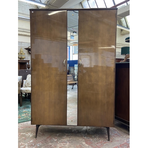 112 - A mid 20th century Meredew walnut double wardrobe - approx. 185cm high x 122cm wide x 56cm deep