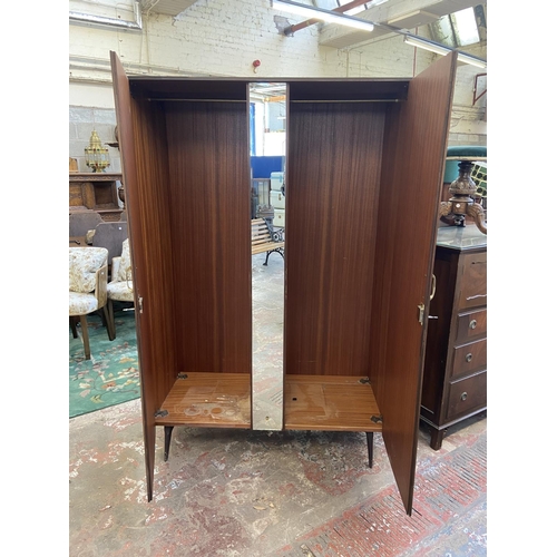 112 - A mid 20th century Meredew walnut double wardrobe - approx. 185cm high x 122cm wide x 56cm deep