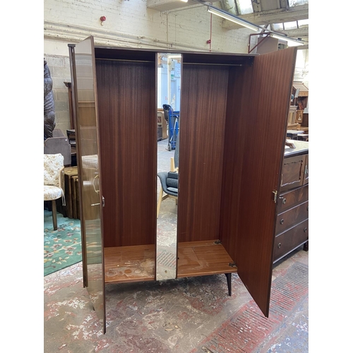 112 - A mid 20th century Meredew walnut double wardrobe - approx. 185cm high x 122cm wide x 56cm deep
