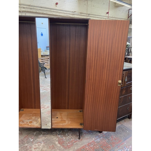 112 - A mid 20th century Meredew walnut double wardrobe - approx. 185cm high x 122cm wide x 56cm deep