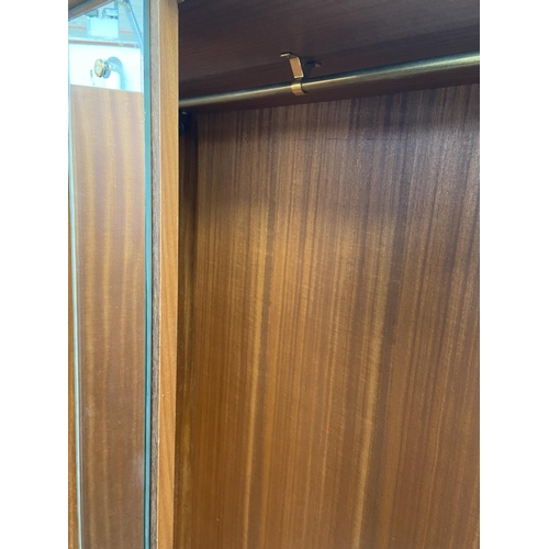 112 - A mid 20th century Meredew walnut double wardrobe - approx. 185cm high x 122cm wide x 56cm deep