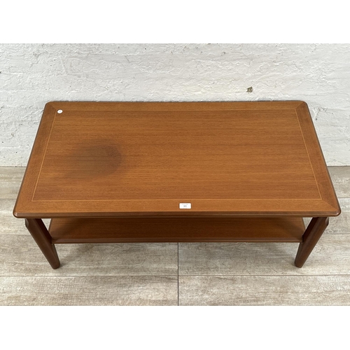 115 - A Legate teak coffee table - approx. 47cm high x 56cm wide x 108cm long