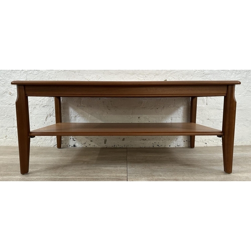 115 - A Legate teak coffee table - approx. 47cm high x 56cm wide x 108cm long