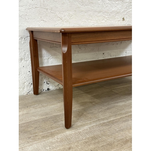 115 - A Legate teak coffee table - approx. 47cm high x 56cm wide x 108cm long
