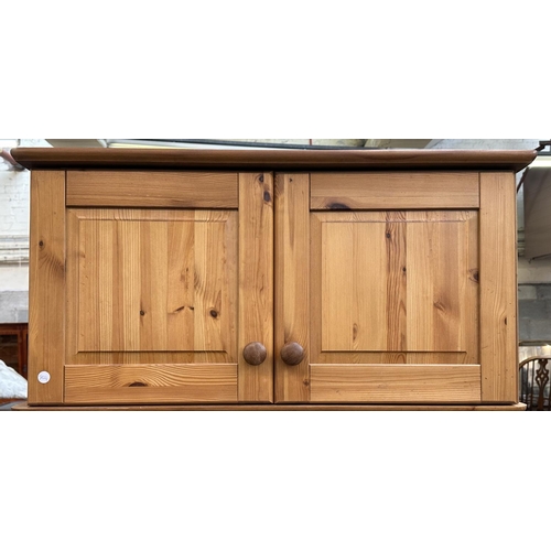 116 - A pine double wardrobe with later added top - approx. 220cm high x 85cm wide x 55cm deep