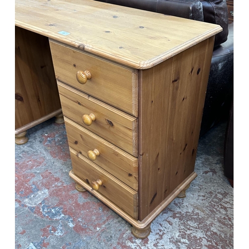 117 - A pine dressing table - approx. 74cm high x 132cm wide x 38cm deep
