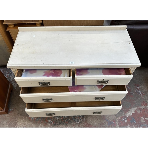 123 - A Victorian white painted chest of drawers - approx. 86cm high x 104cm wide x 46cm deep