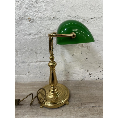 125 - A brass and green glass banker's desk lamp - approx. 39cm high