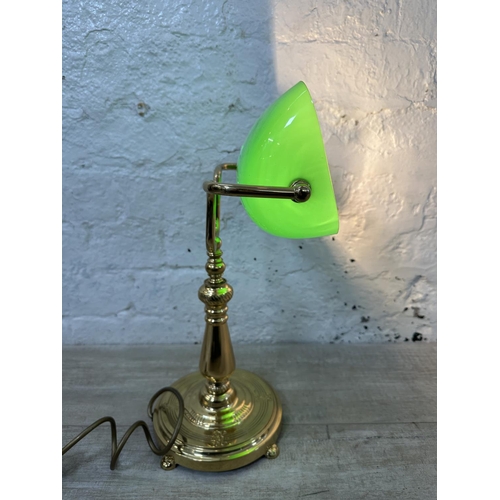 125 - A brass and green glass banker's desk lamp - approx. 39cm high