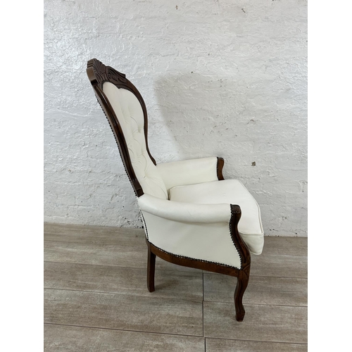 127 - A Victorian style carved beech and white faux leather spoon back armchair - approx. 109cm high x 70c... 