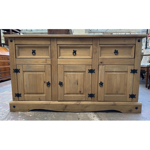 129 - A Mexican pine sideboard - approx. 82cm high x 144cm wide x 49cm deep