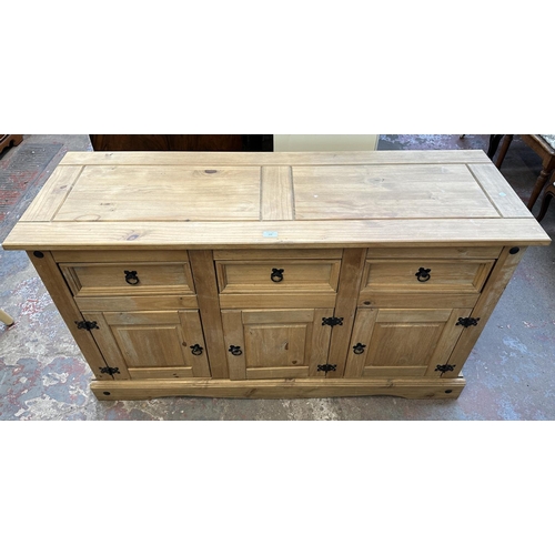 129 - A Mexican pine sideboard - approx. 82cm high x 144cm wide x 49cm deep