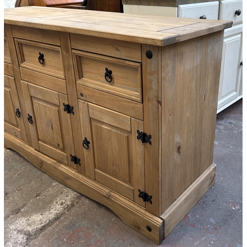 129 - A Mexican pine sideboard - approx. 82cm high x 144cm wide x 49cm deep