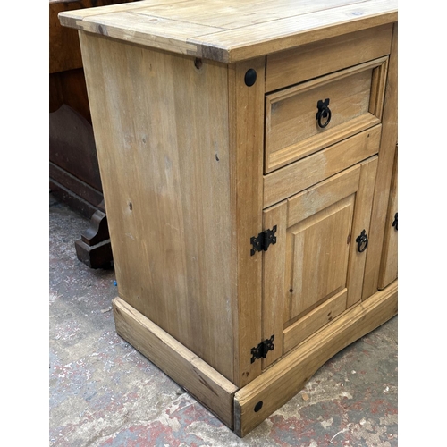 129 - A Mexican pine sideboard - approx. 82cm high x 144cm wide x 49cm deep