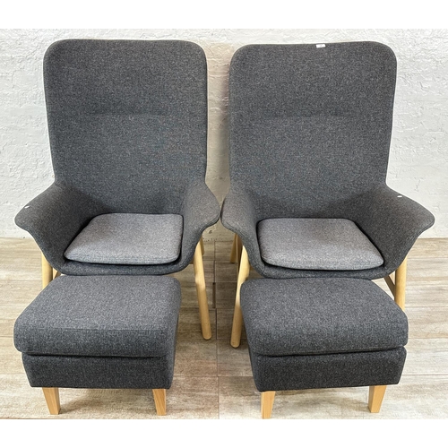 130 - A pair of IKEA grey fabric upholstered and beech armchairs with footstools