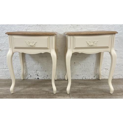 137 - A pair of French style limed oak and white painted side tables - approx. 66cm high x 50cm wide x 42c... 