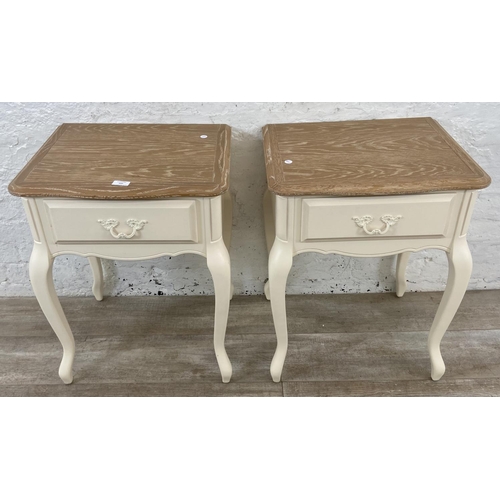 137 - A pair of French style limed oak and white painted side tables - approx. 66cm high x 50cm wide x 42c... 