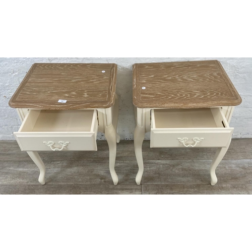 137 - A pair of French style limed oak and white painted side tables - approx. 66cm high x 50cm wide x 42c... 