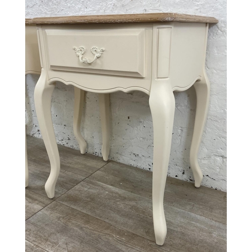 137 - A pair of French style limed oak and white painted side tables - approx. 66cm high x 50cm wide x 42c... 