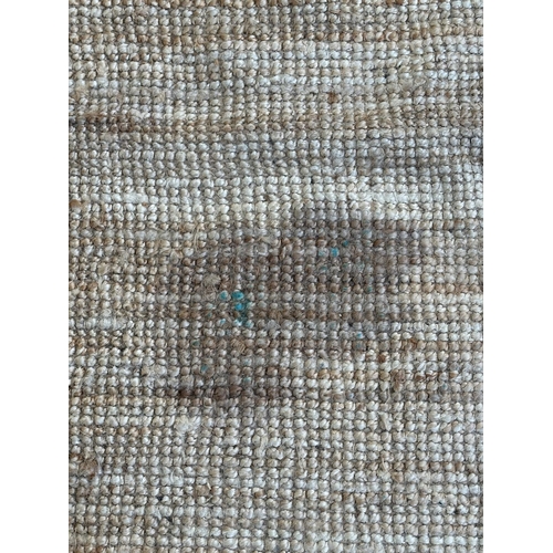 138 - A modern natural fibre rug - approx. 298cm x 197cm