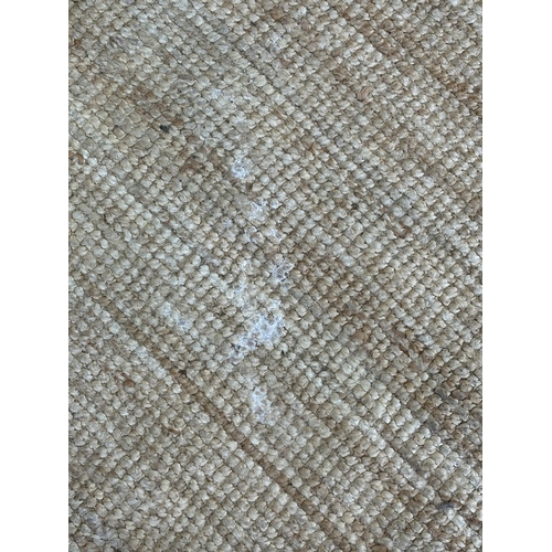 138 - A modern natural fibre rug - approx. 298cm x 197cm