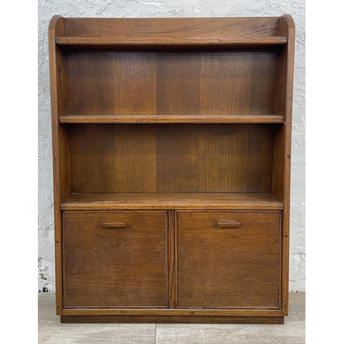 139 - A mid 20th century oak three tier bookcase - approx. 97cm high x 74cm wide x 20cm deep