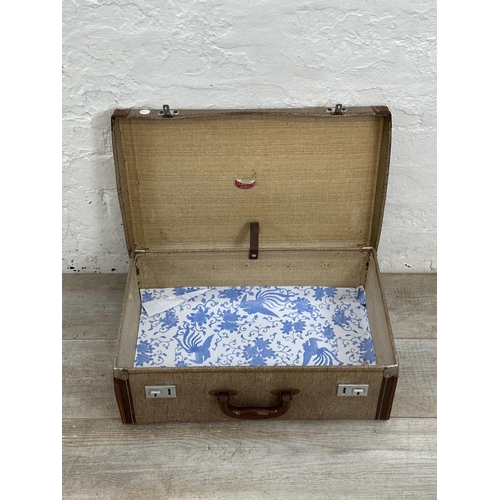 14 - Seven mid 20th century travel trunks - largest approx. 26cm high x 77cm wide x 50cm deep