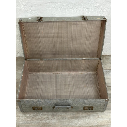 14 - Seven mid 20th century travel trunks - largest approx. 26cm high x 77cm wide x 50cm deep