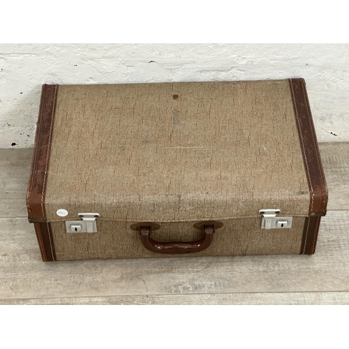 14 - Seven mid 20th century travel trunks - largest approx. 26cm high x 77cm wide x 50cm deep