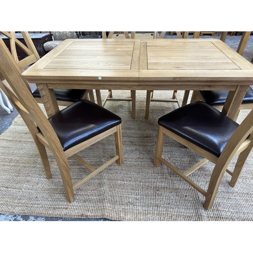 154 - A modern oak extending dining table and six chairs - approx. 77cm high x 90cm wide x 150cm long