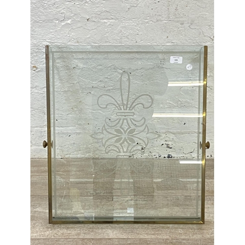 155 - A brass and glass display case cover with fleur-de-lis motif - approx. 8cm high x 51cm wide x 59cm l... 